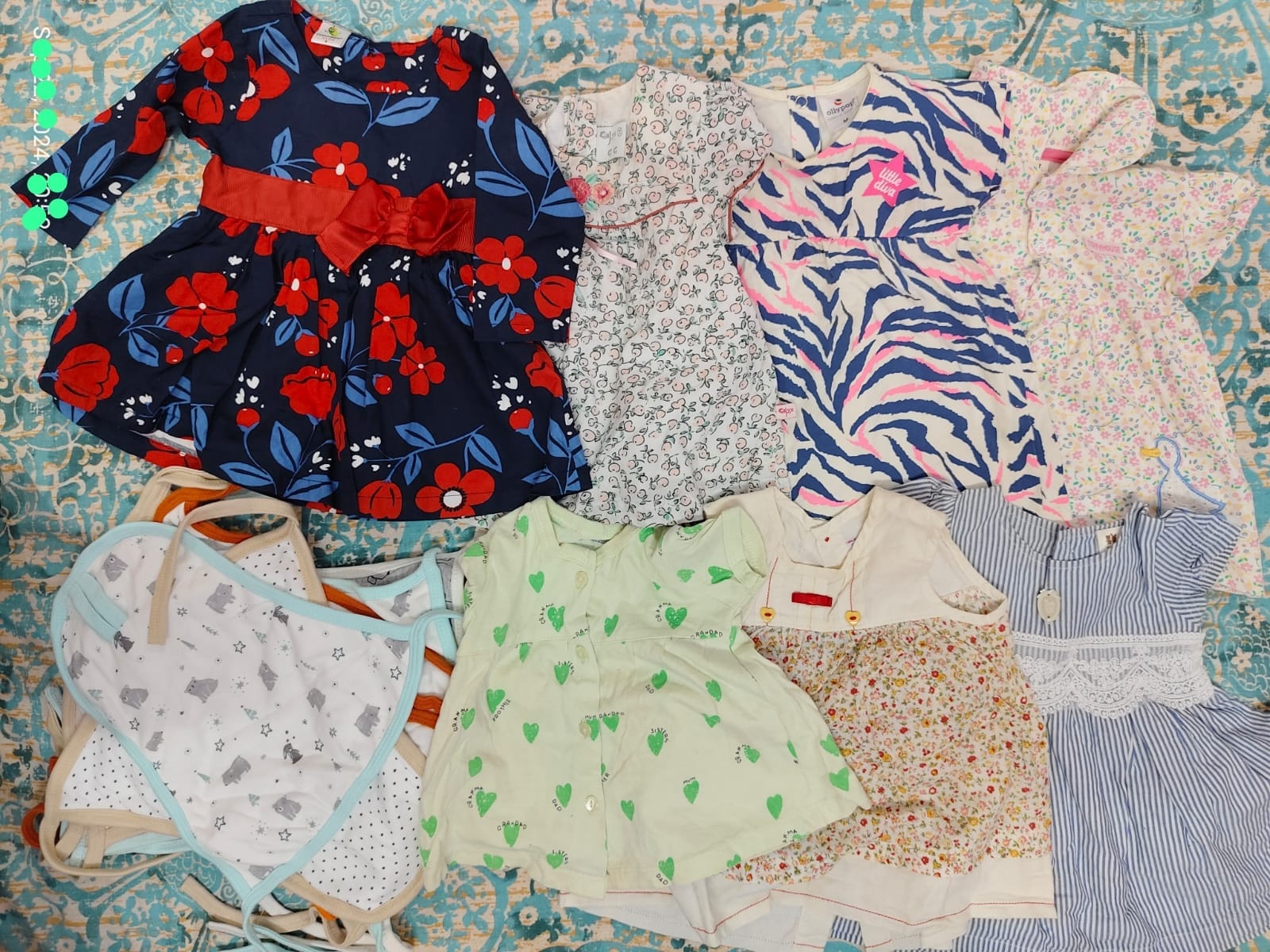 Assorted set of preloved soft cotton clothing items for baby (0-3 months)