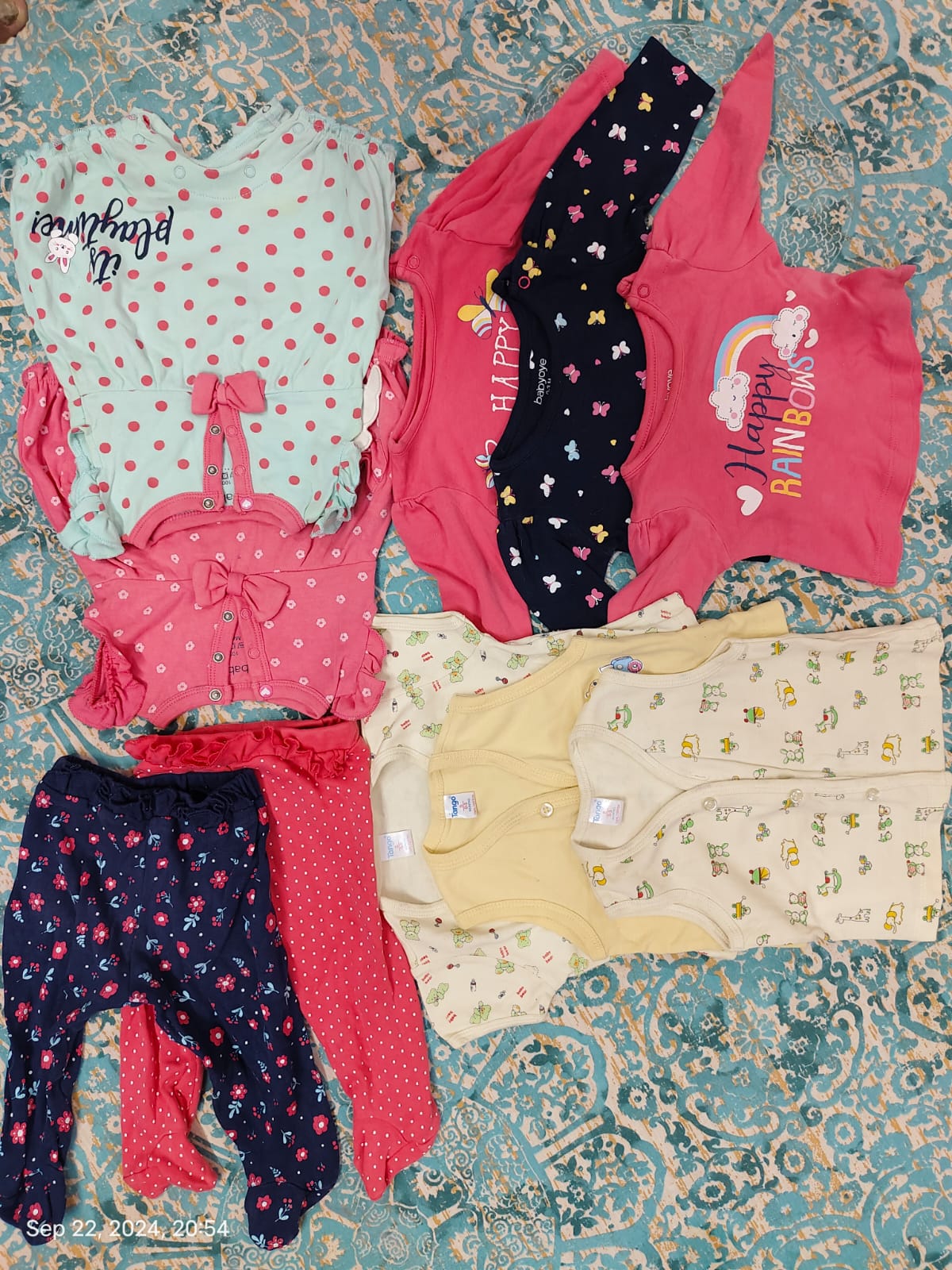 Assorted set of preowned soft cotton clothing items (0-3 months)