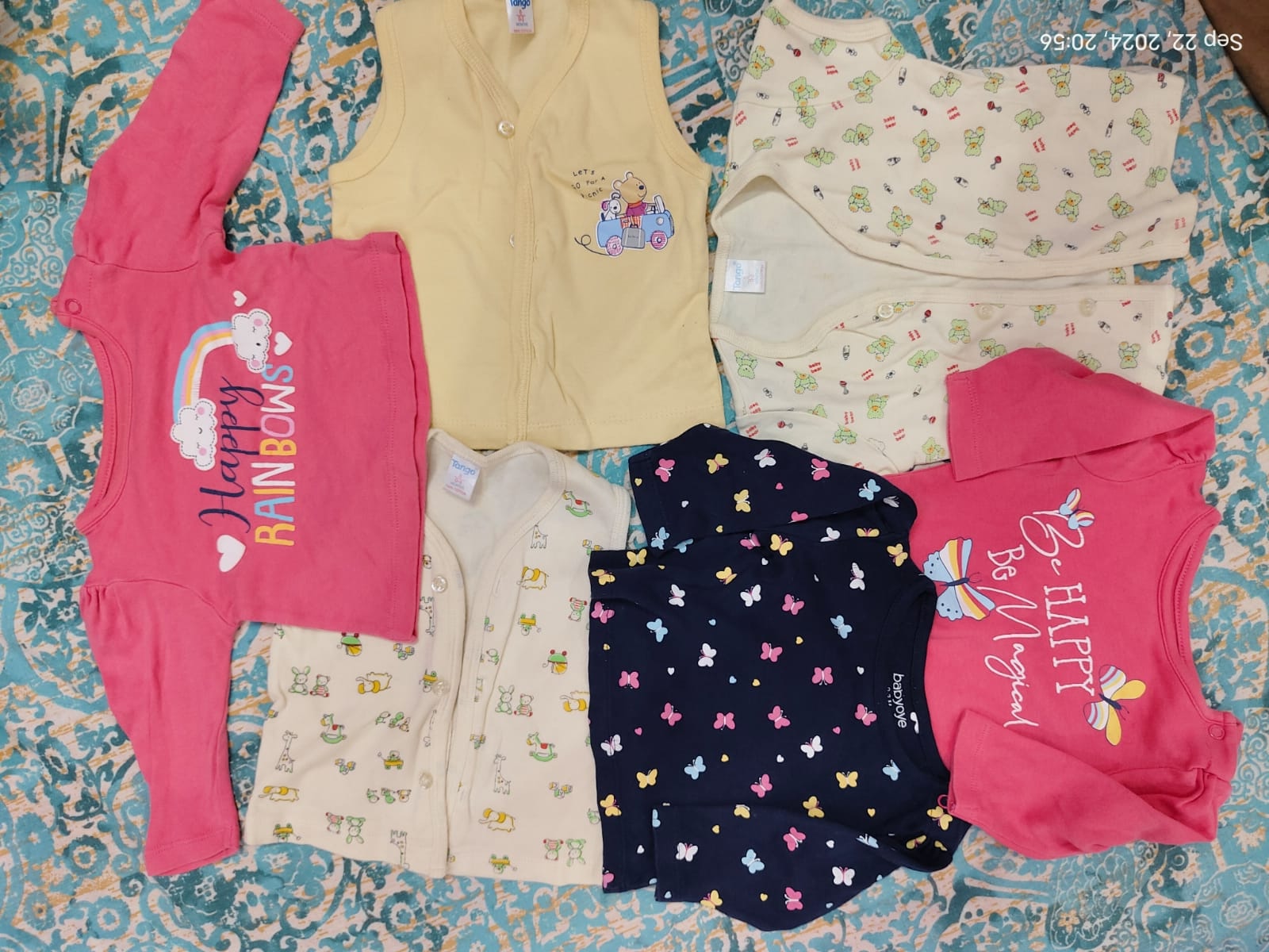 Assorted set of secondhand soft cotton clothing items (0-3 months)