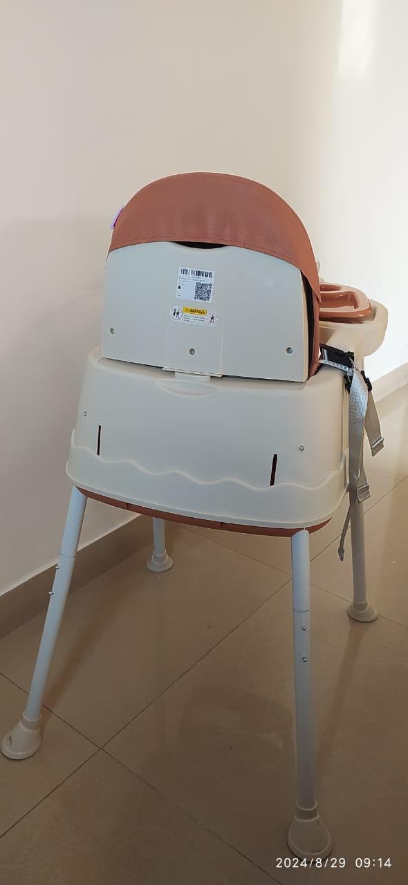 Preowned but unused NEW Babyhug feeding chair