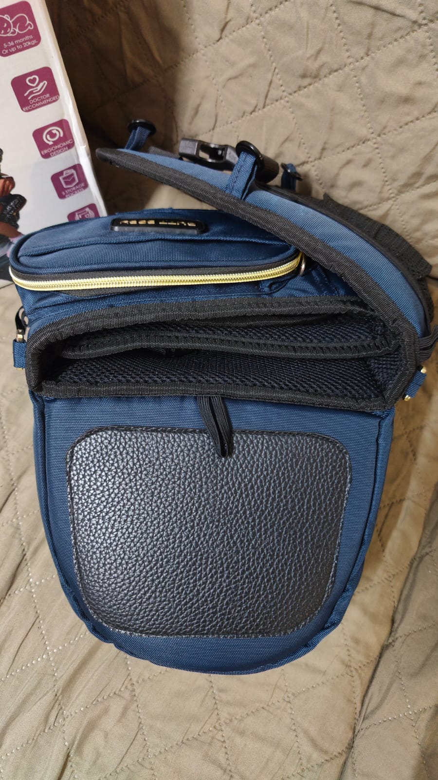 preowned but unused Like New Butt Baby Carrier