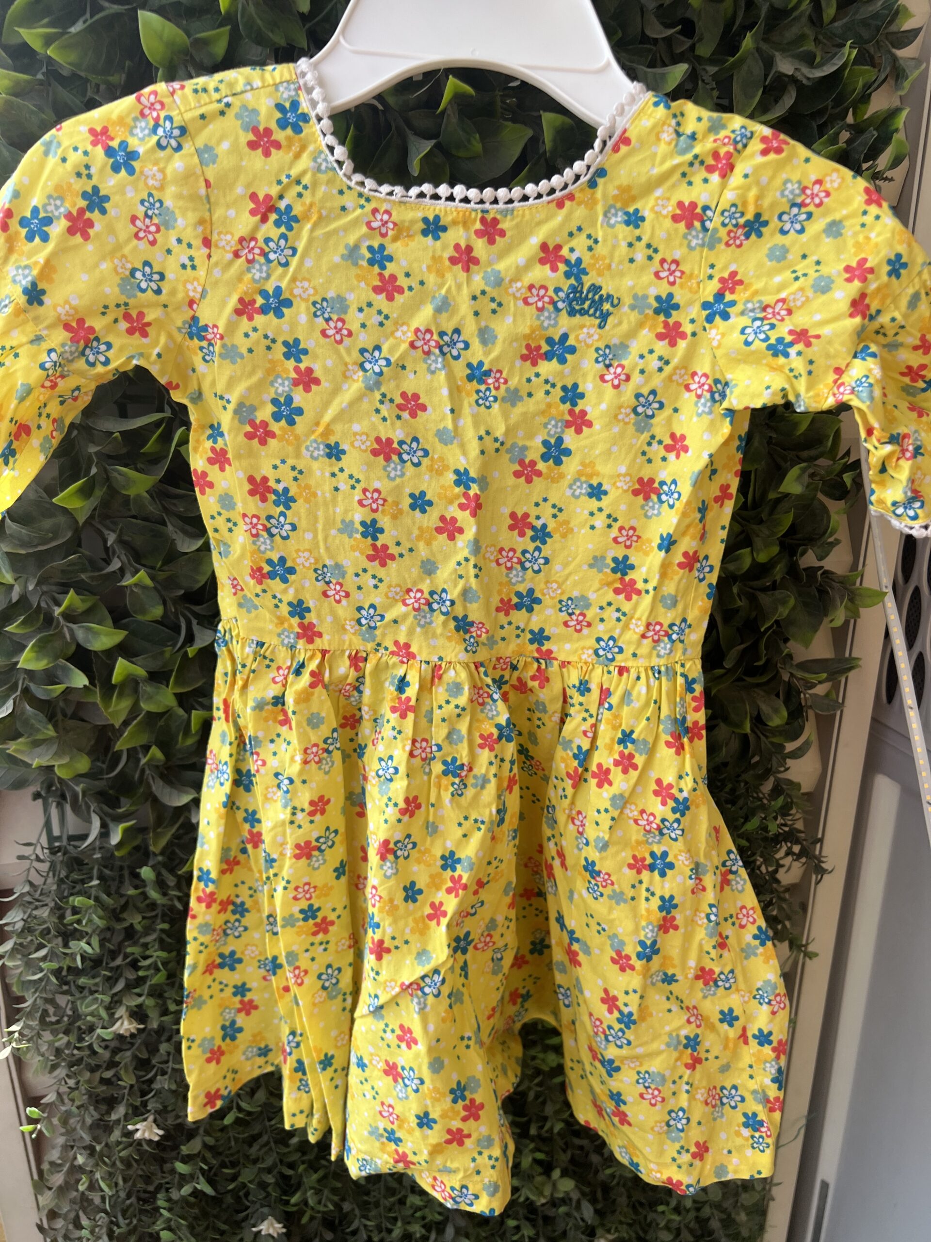 Gently used Allen Solly yellow printed frock (2-3 years)