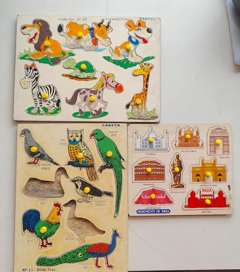 Gently used kids wooden peg puzzles for sale