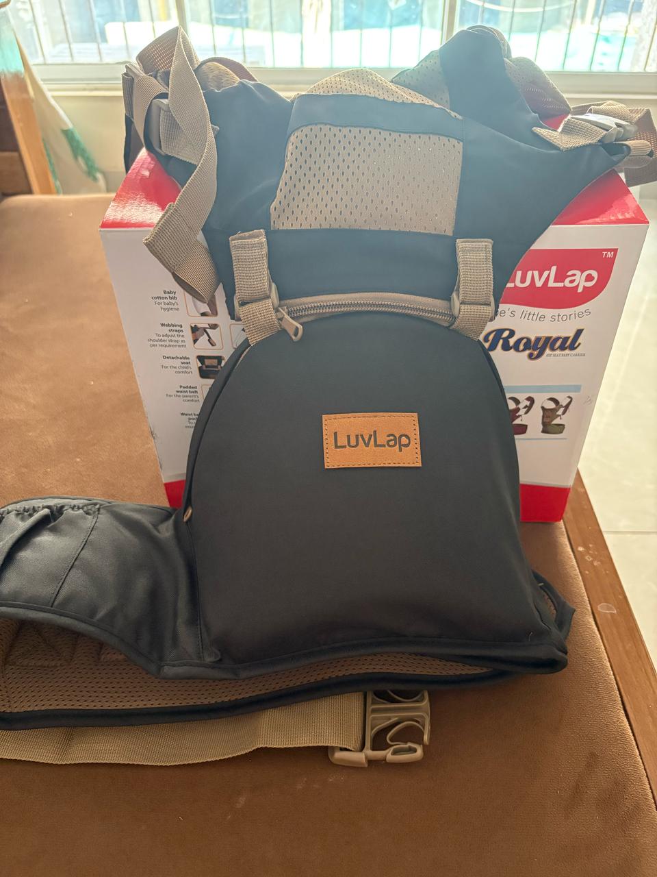 Second hand but unused New Luvlap 4 in 1 hip seat baby carrier