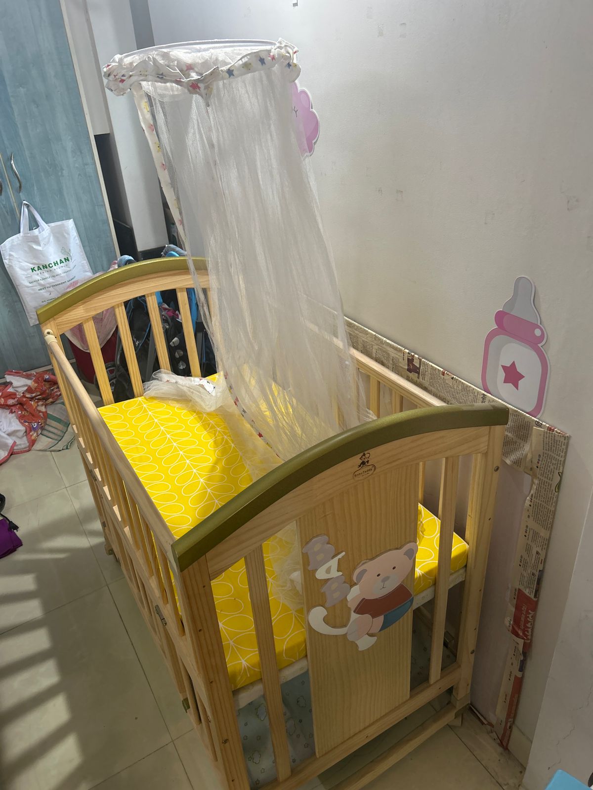 Preowned wooden baby cot with mattress and mosquito net ( Mumbai )