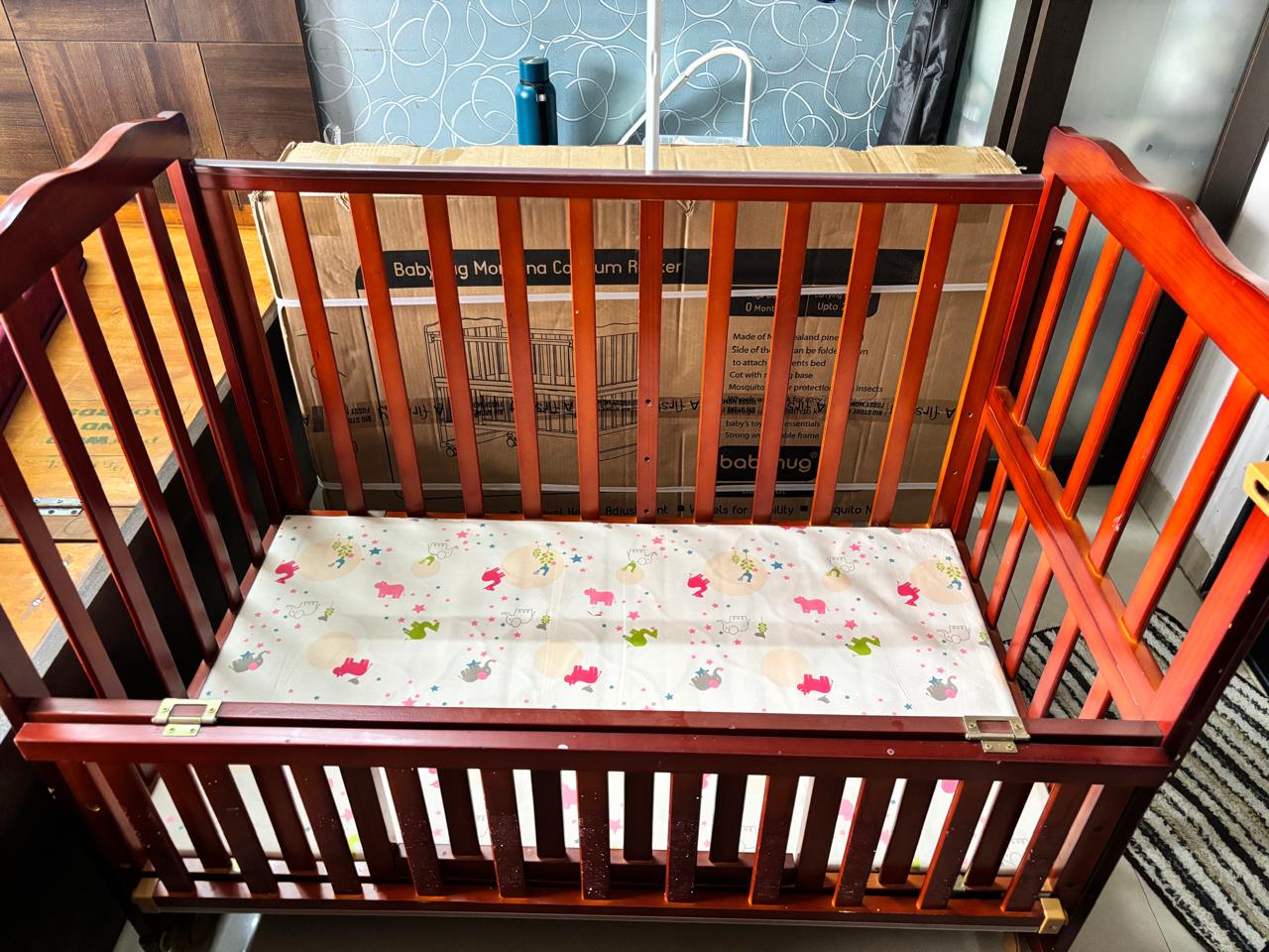 Gently used Babyhug montana cot cum rocker with mosquito net ( Mumbai )