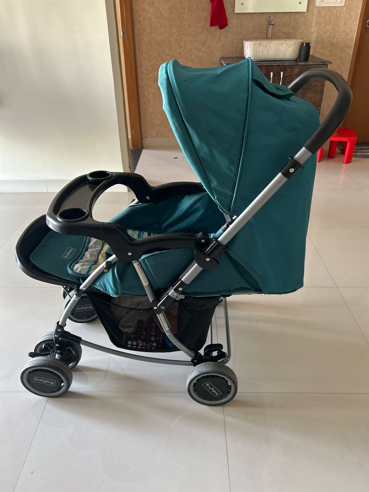 Used Babyhug rocker cum stroller for sale in Hyderabad
