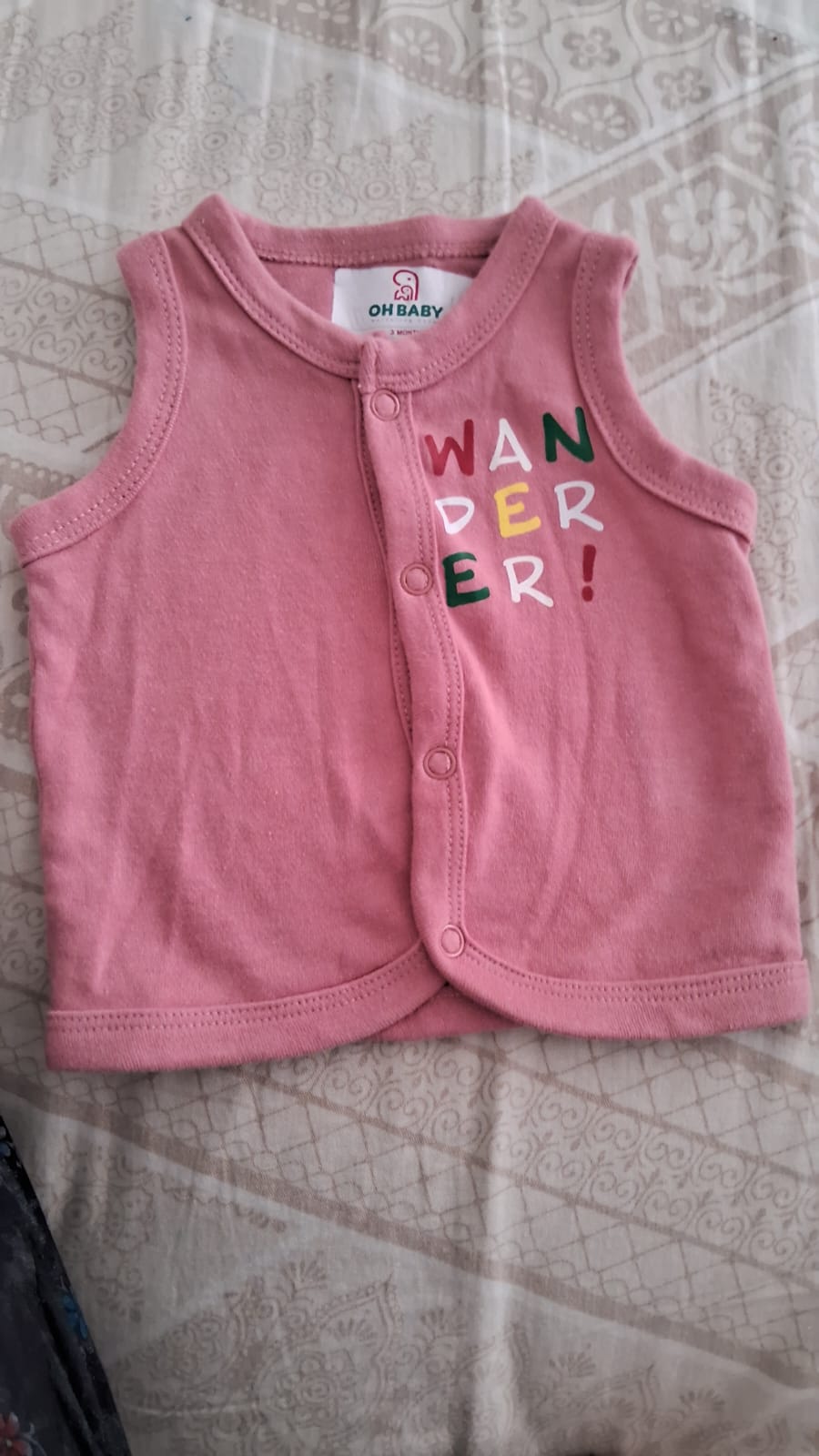 Used baby shirt for 0-3 month olds in sustainable fabric