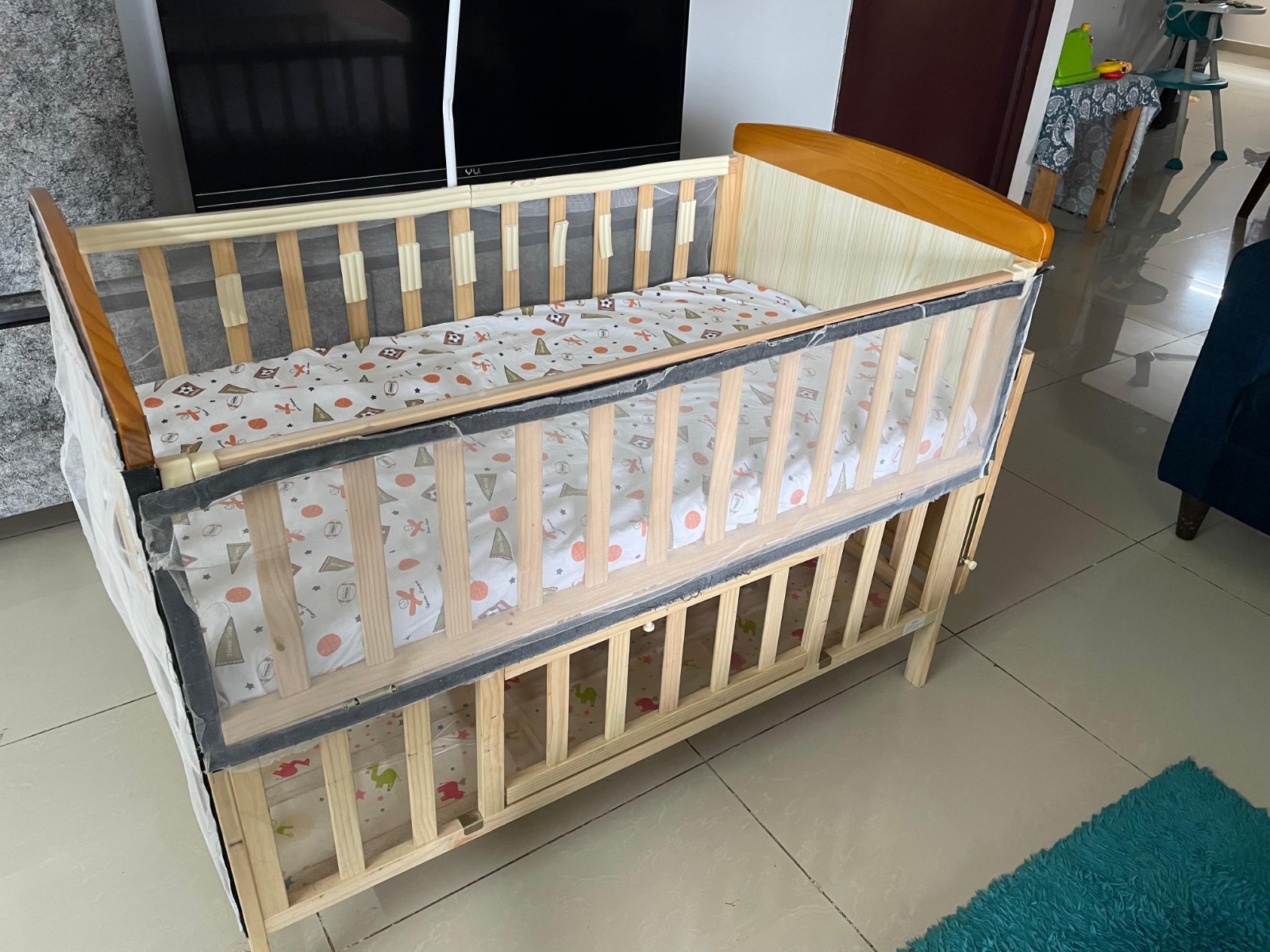 Secondhand Babyhug wooden cot for nursery