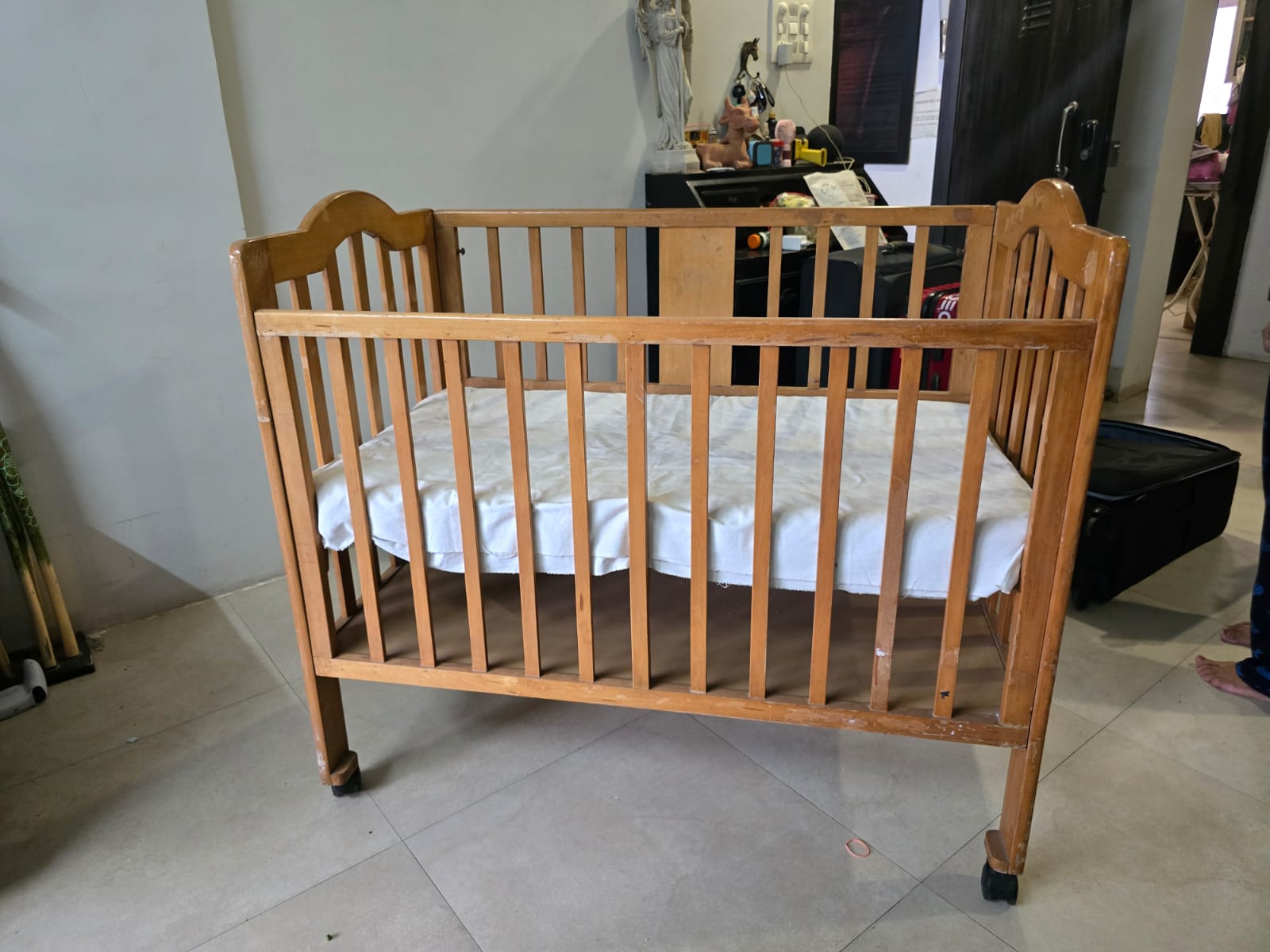 Thrifted baby cot - perfect for minimalist parenting