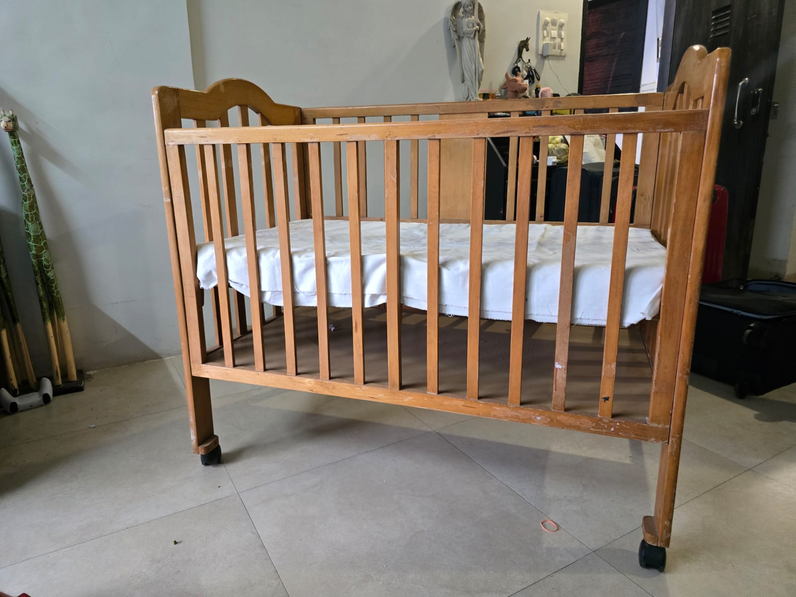 Thrifted baby cot - perfect for minimalist parenting
