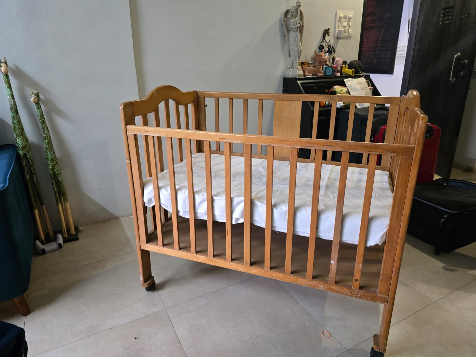 Sustainable preowned baby cot for urban families
