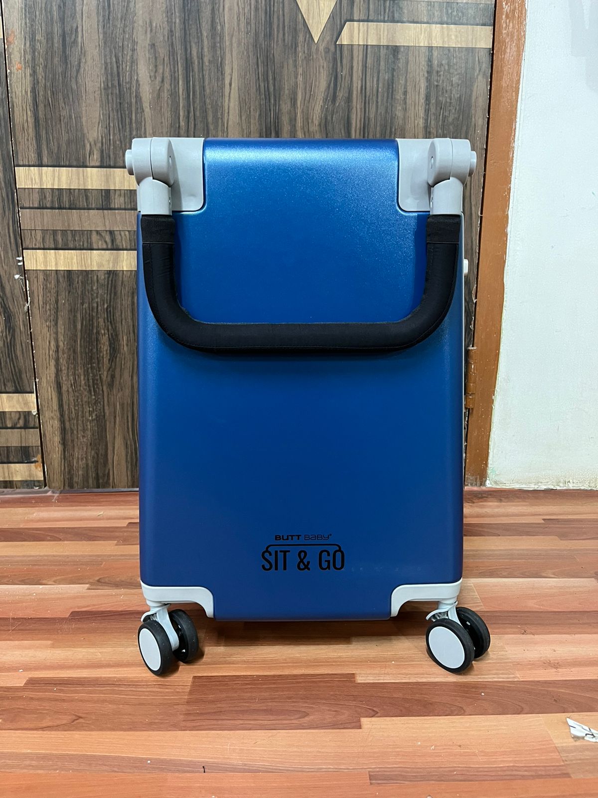 Eco-conscious travel gear - Buttbaby Midnight Blue baby ride on travel bag by Butt Baby