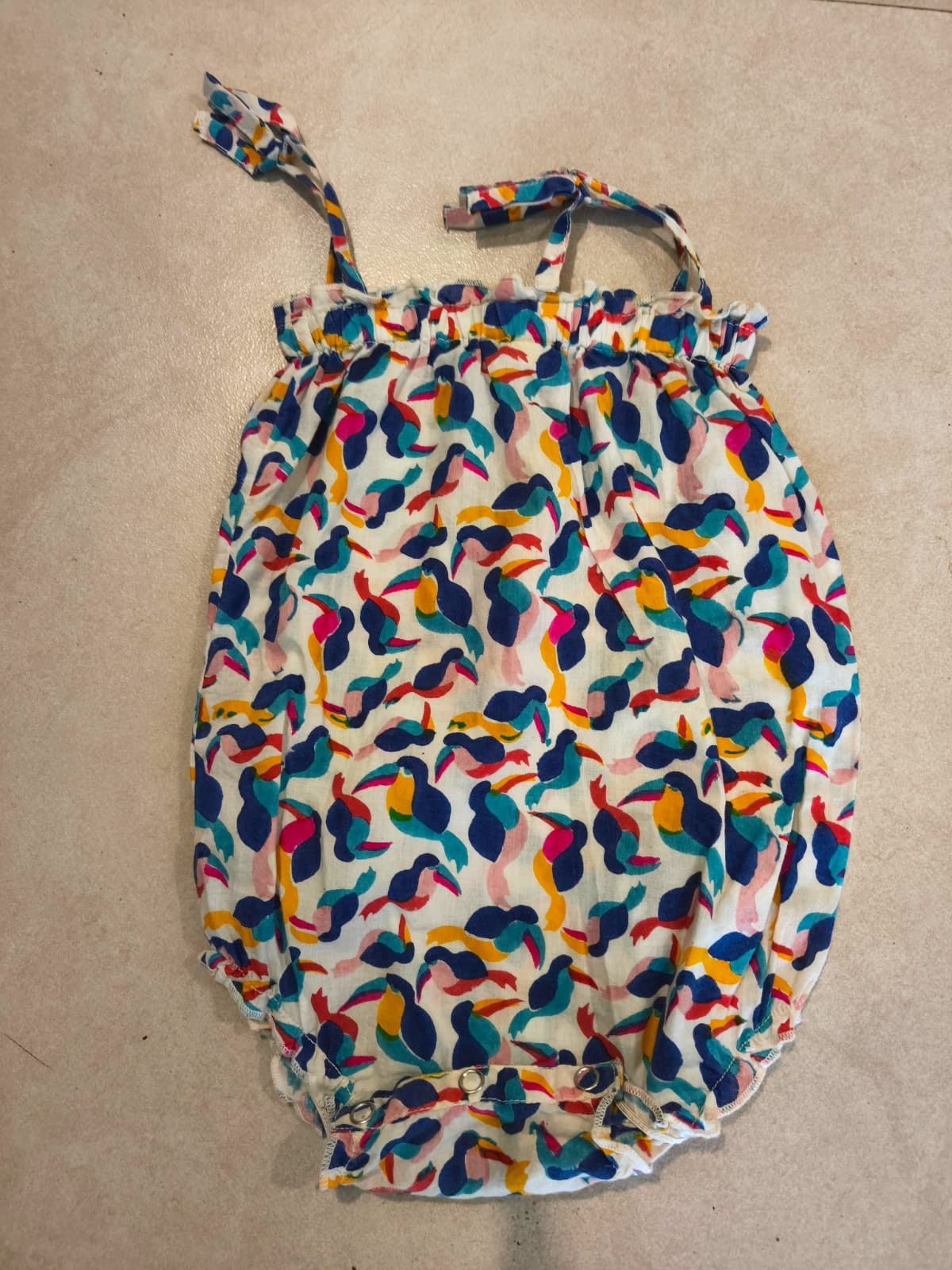 Sustainable preloved onesies for babies