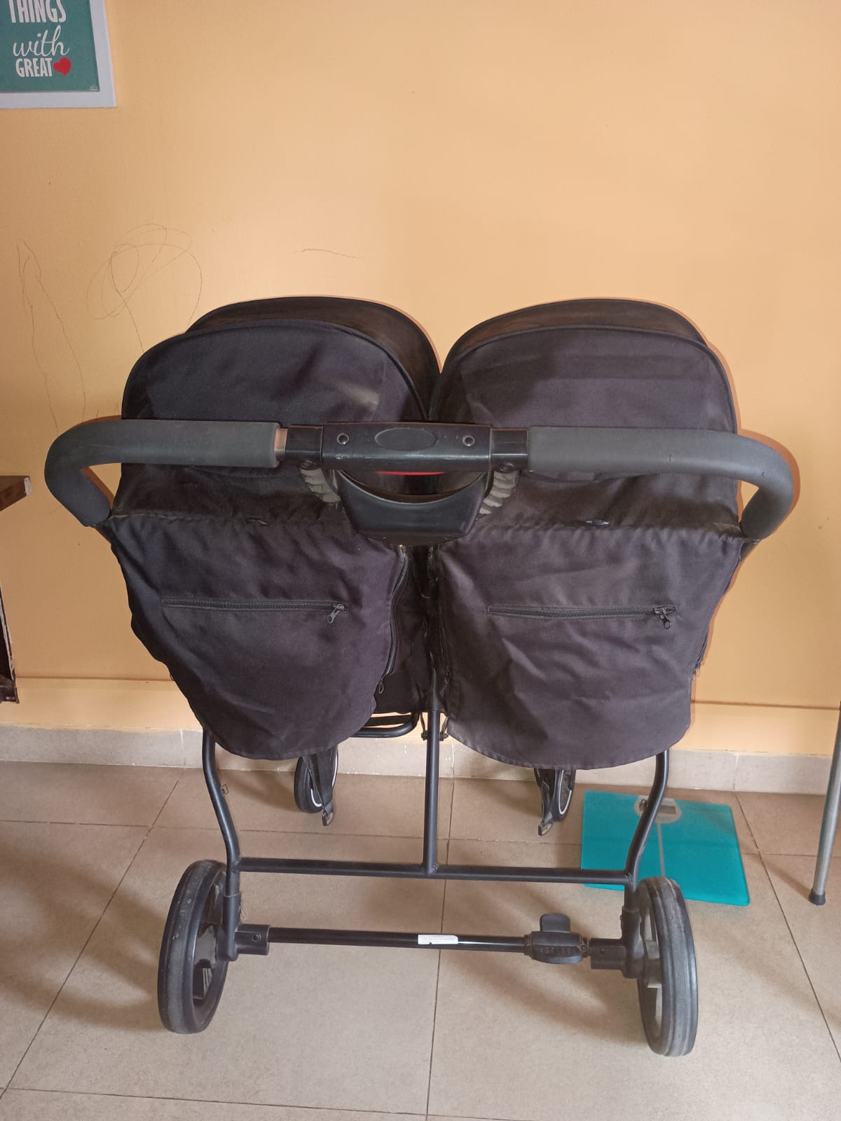 Preowned LuvLap twin pram in excellent condition