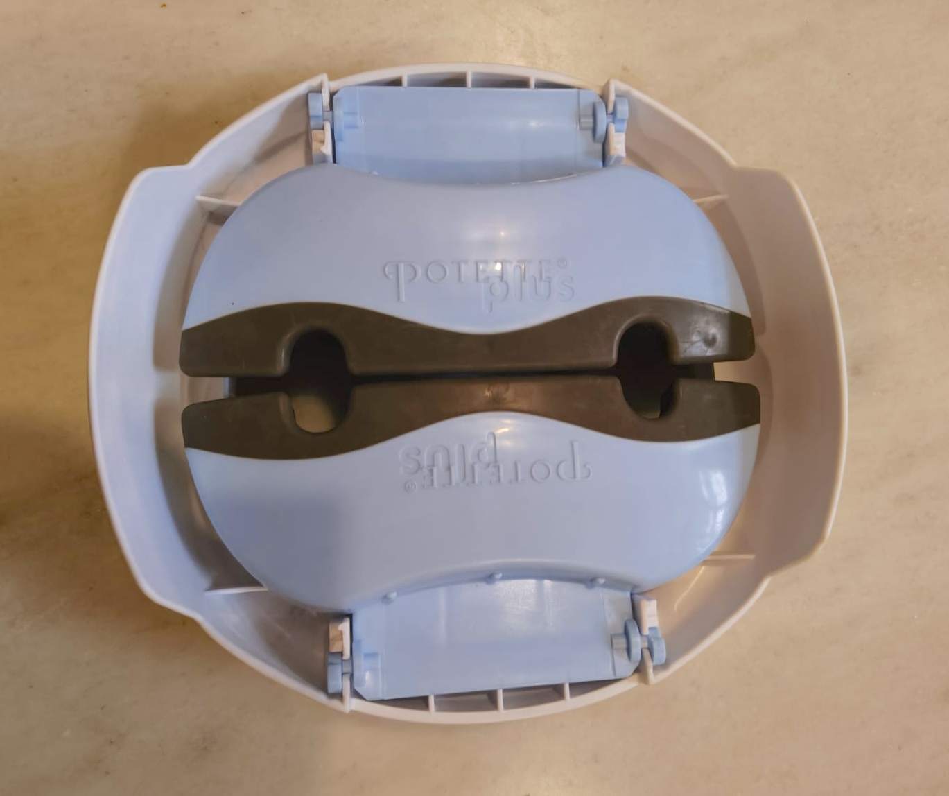 Preowned Potette Plus travel potty in good condition