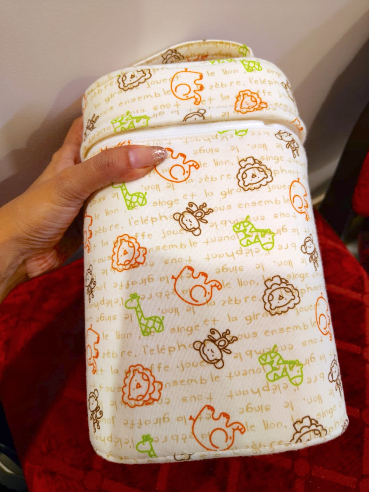 Travel friendly baby bottle carrier keeps milk warm