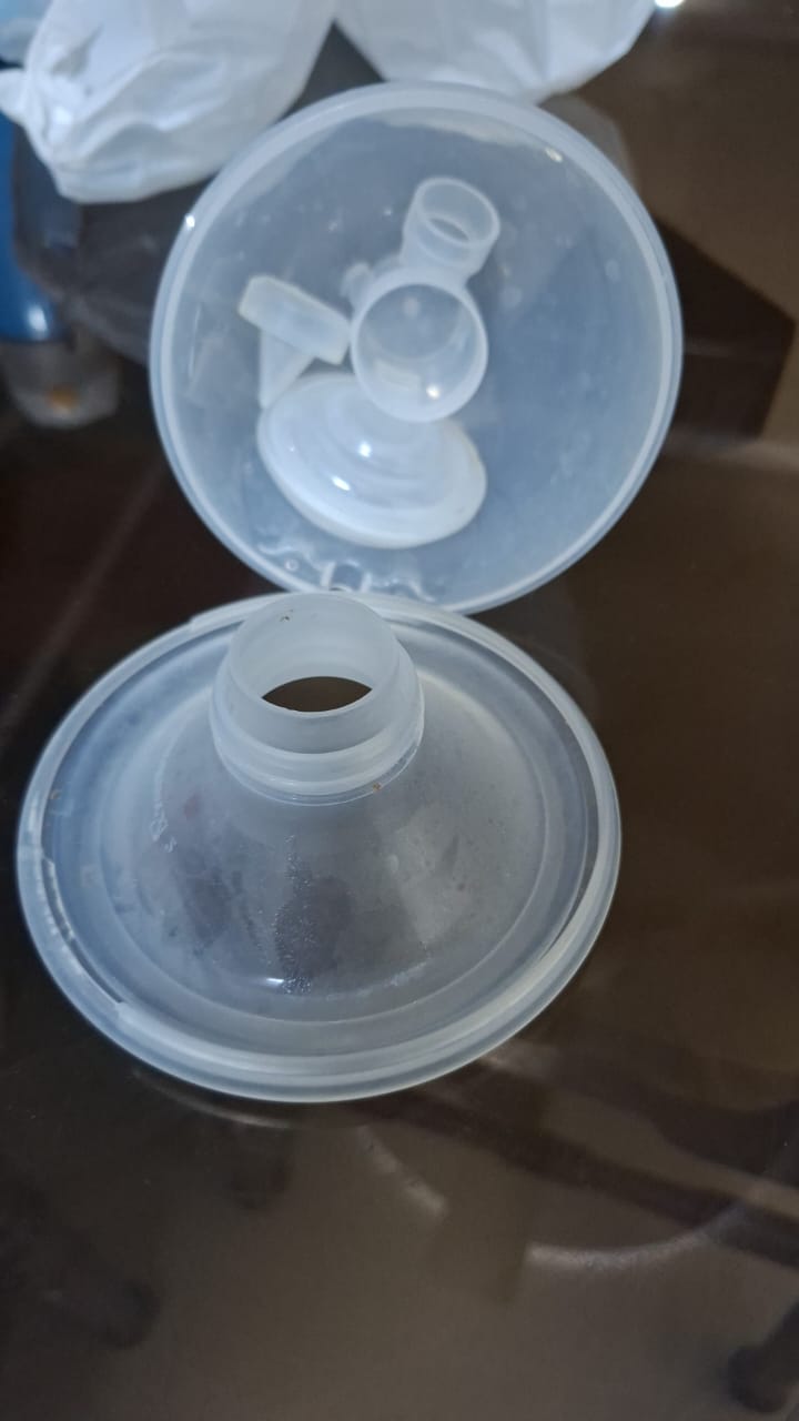 Preowned wearable breast pump Momcozy