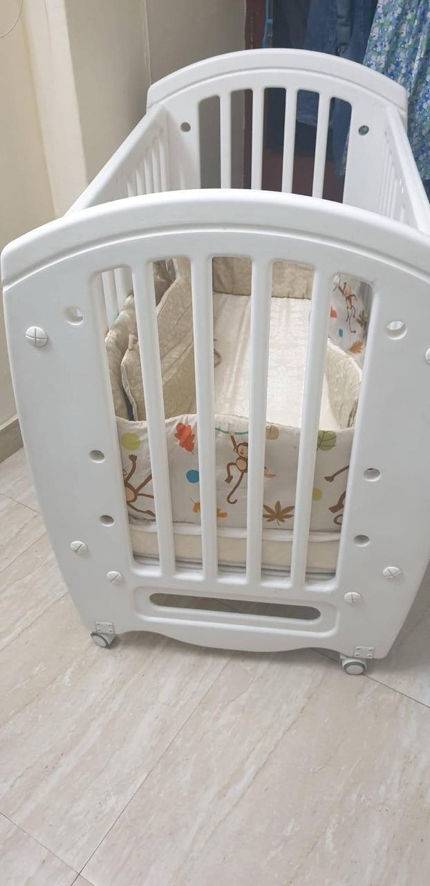 Sturdy Babyhug crib preloved India
