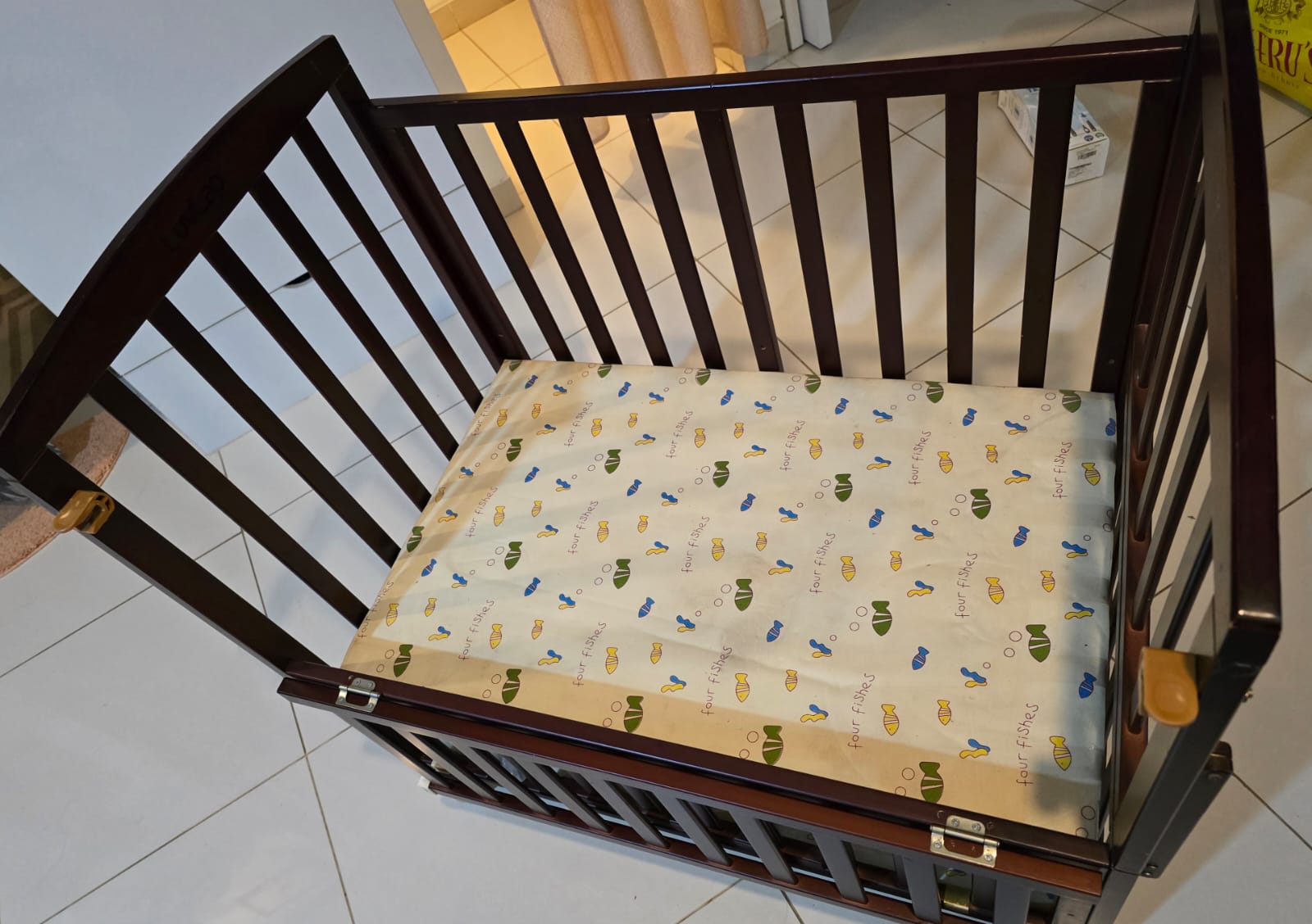 Preloved wooden baby crib in good condition