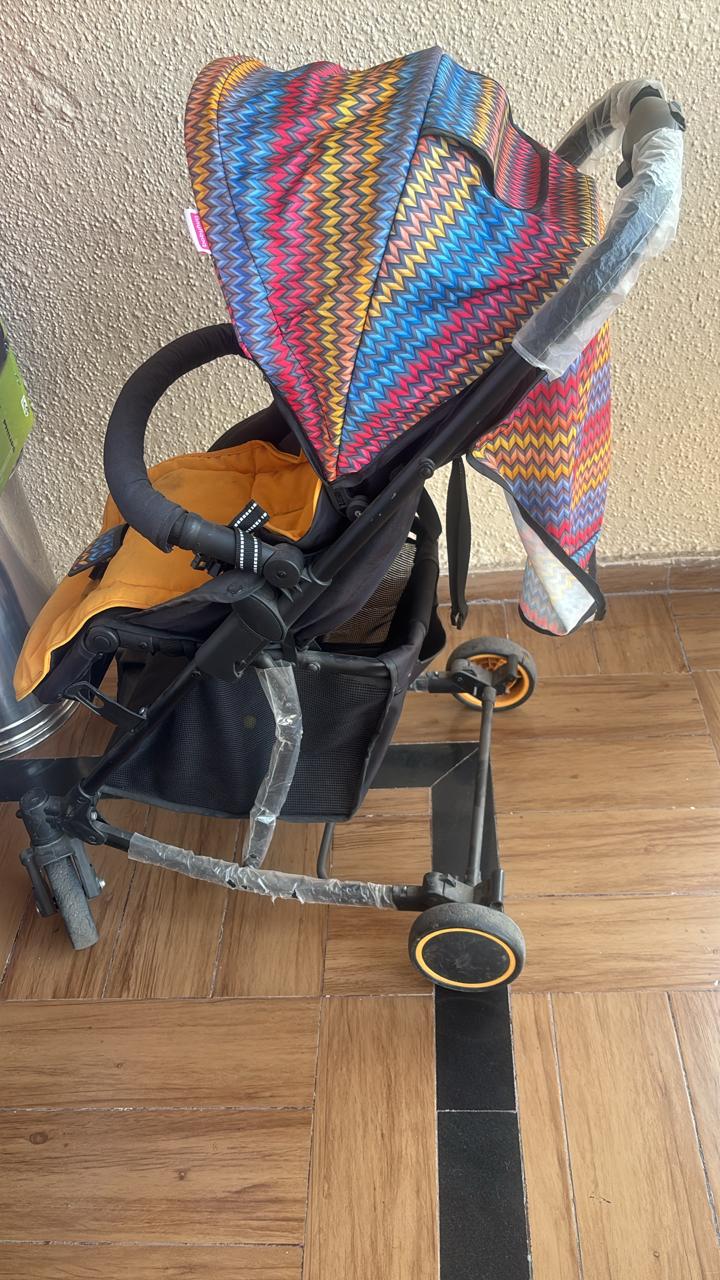 Babyhug 2-in-1 rocker stroller preowned