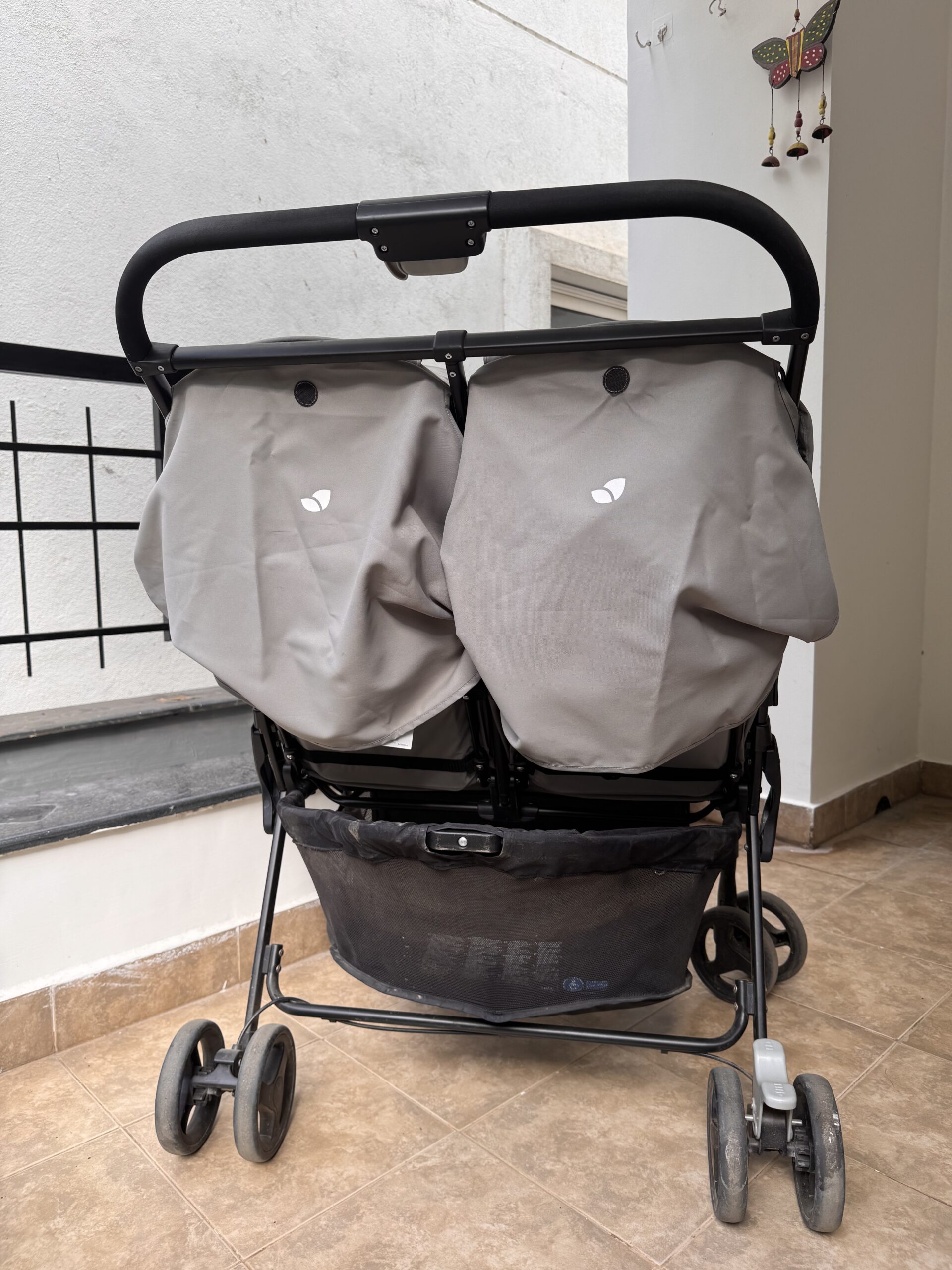 Secondhand Joie twin pram in good condition