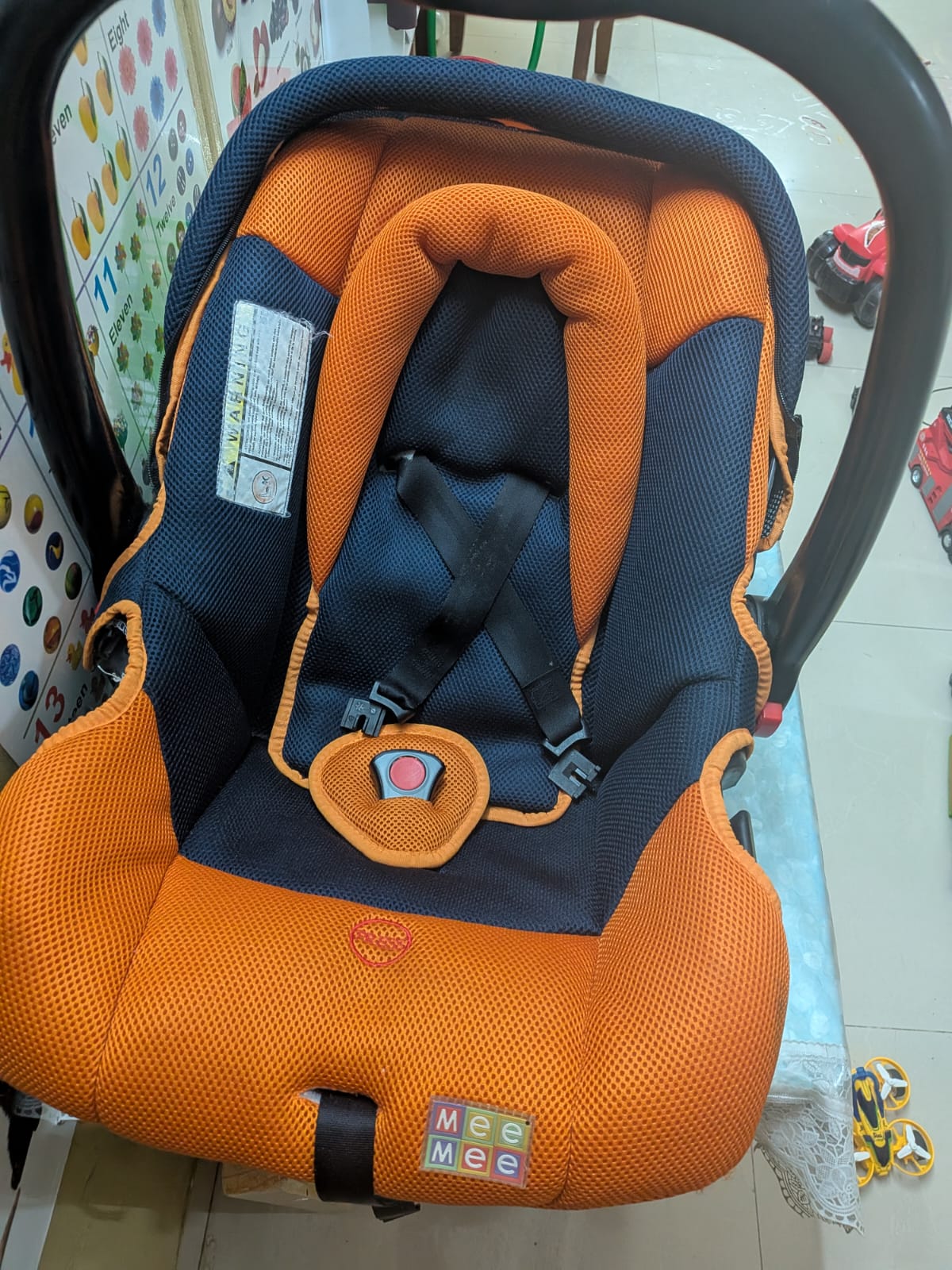 Preowned Mee Mee infant car seat in excellent condition