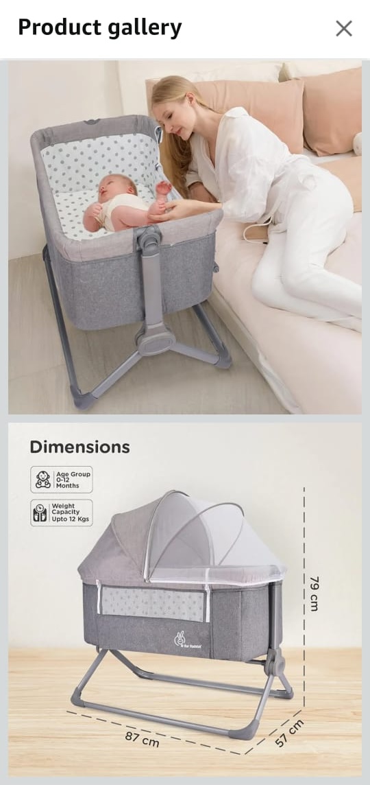 Preowned bedside baby cot in good condition