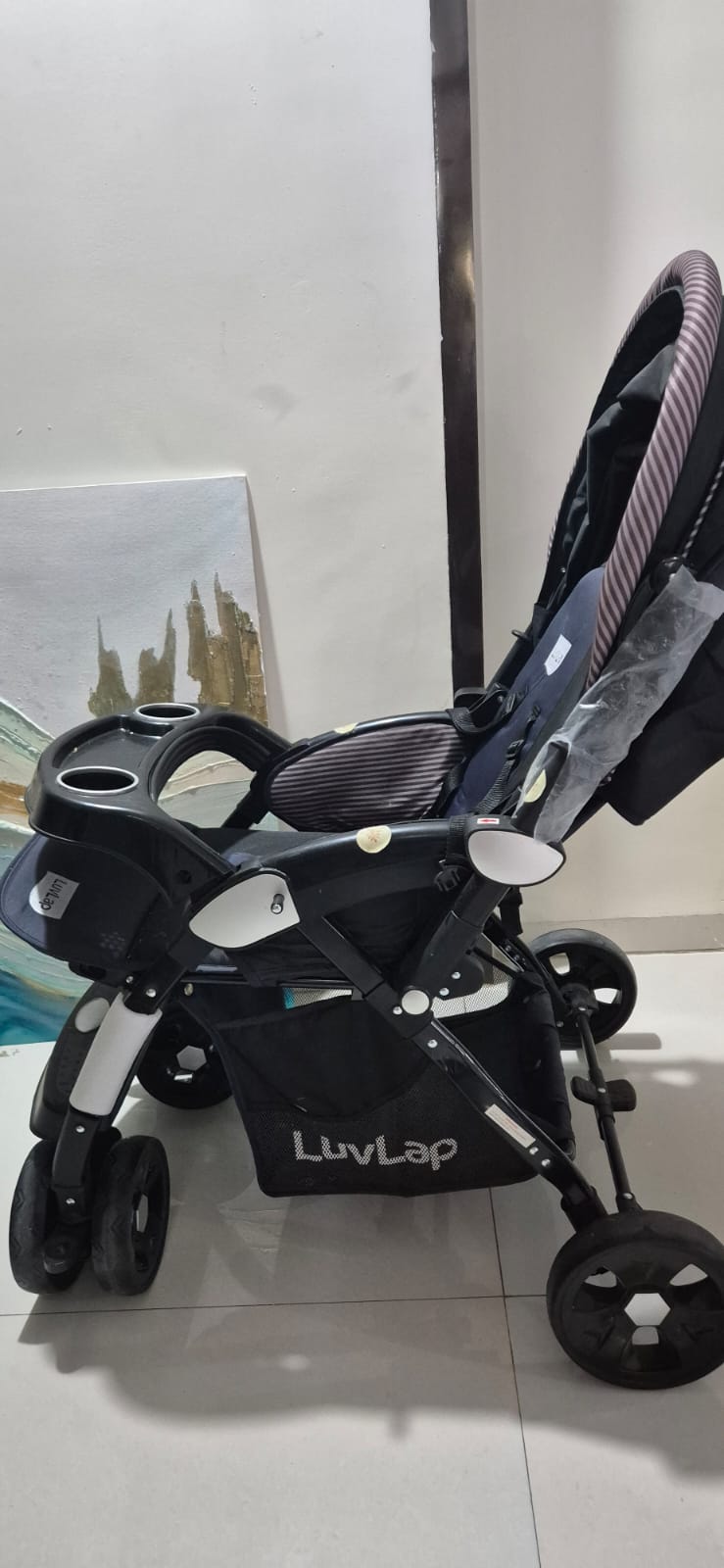 Preowned LuvLap Galaxy stroller in good condition