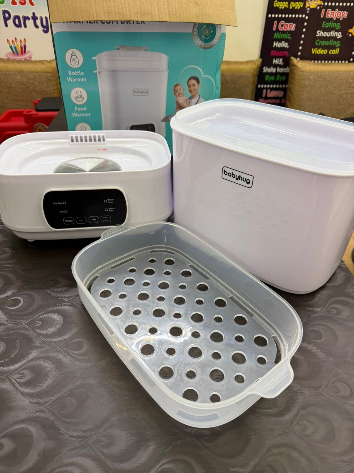 Preowned but unused new Electric baby bottle sterilizer Babyhug