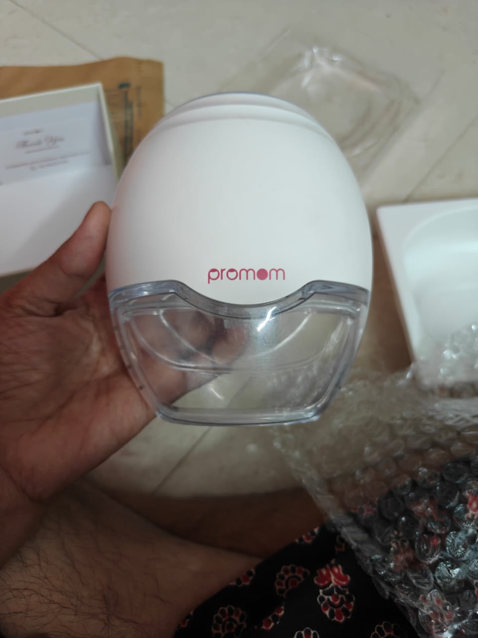 Electric breast pump for nursing moms used