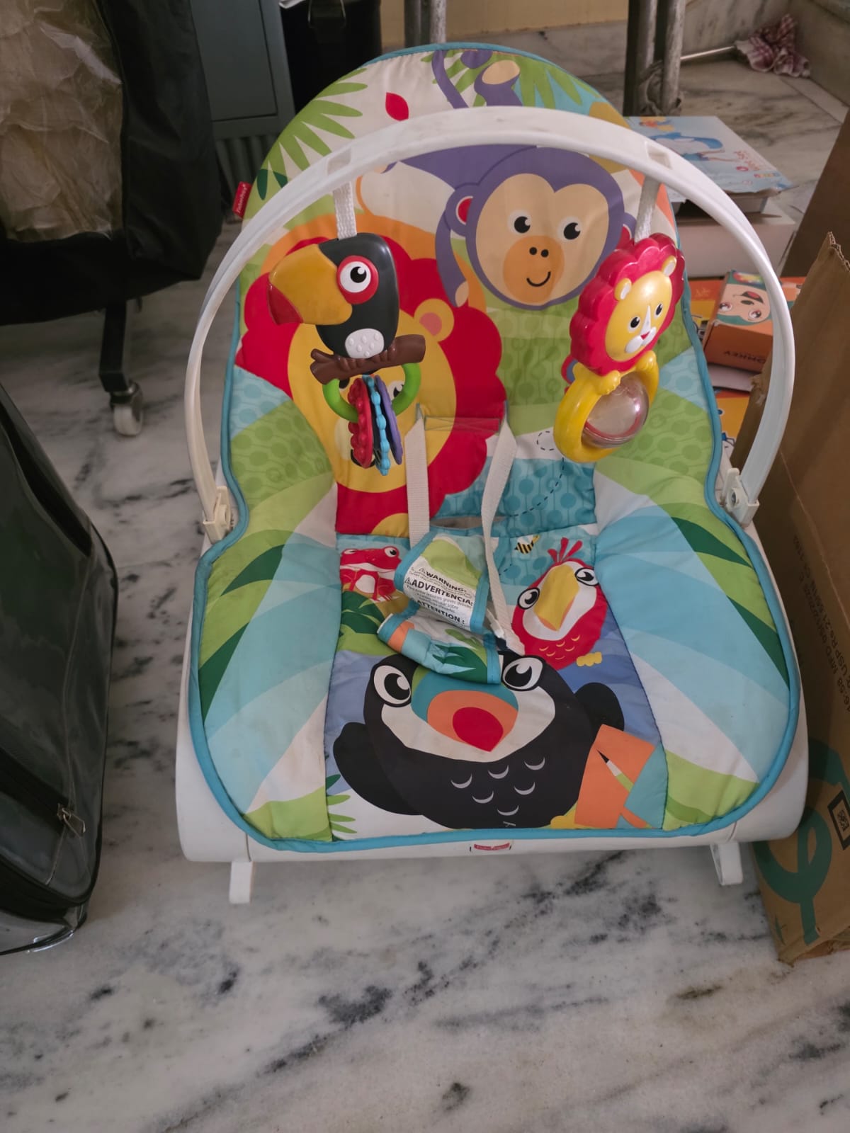 Preowned Fisher Price rocker in good condition