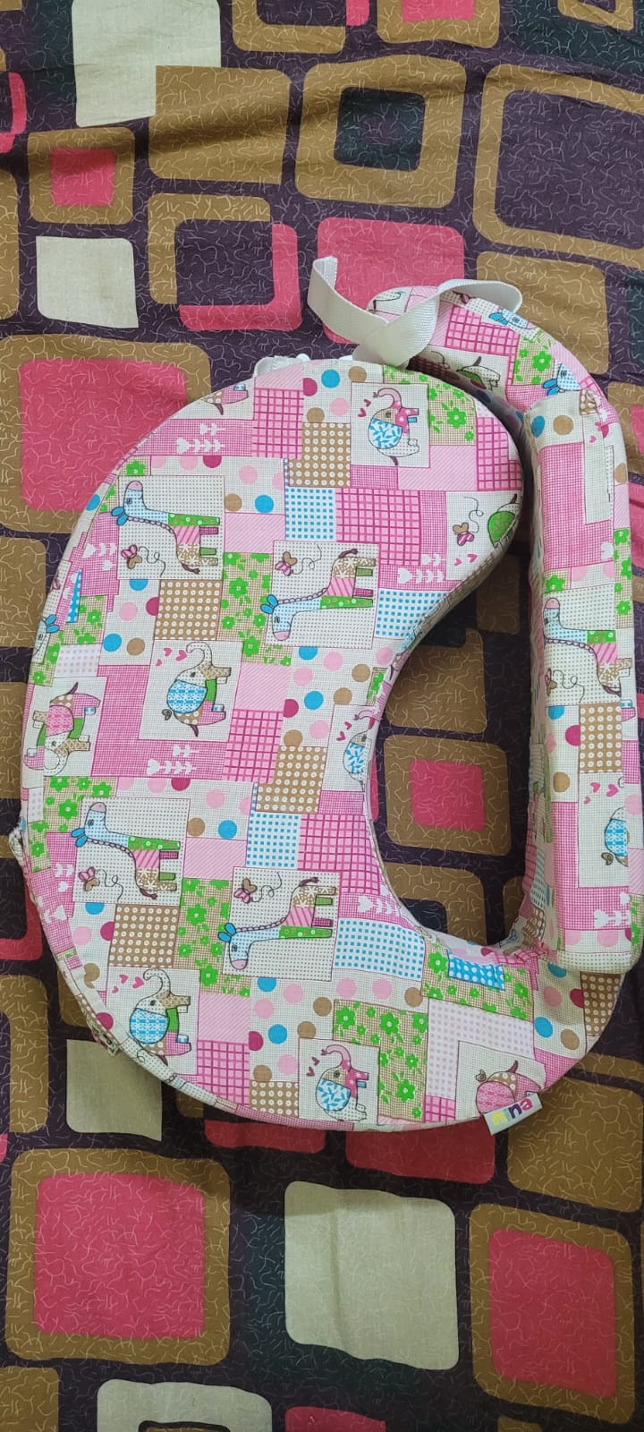 Preowned breastfeeding pillow in good condition